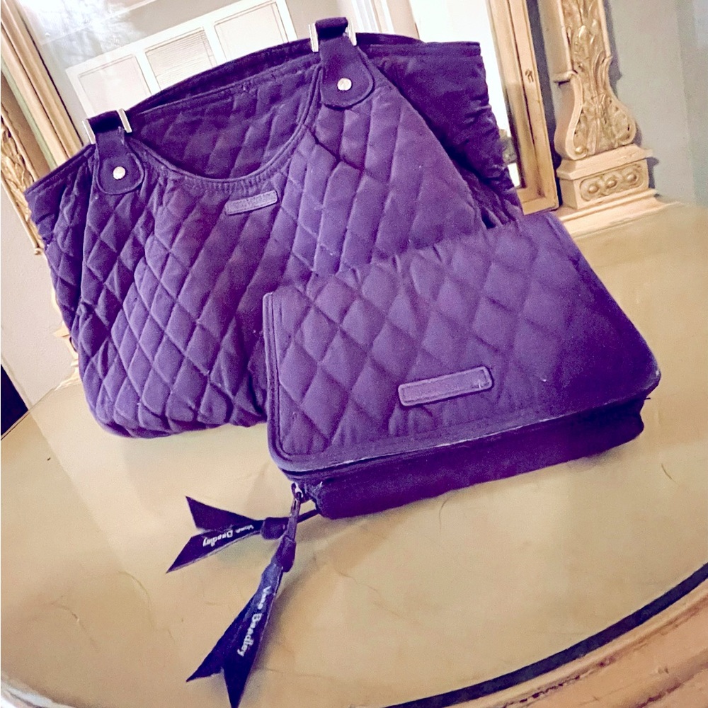 Purple Vera Bradley handbag and matching wallet.